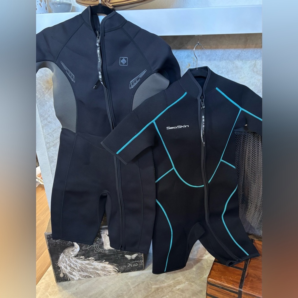 TWO…SeaSkin UNISEX Black Short Sleeve Wetsuit x 2 (1 Small, 1 Medium)